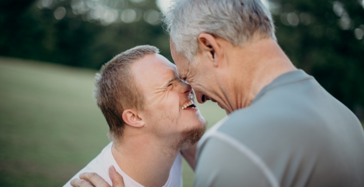 father and son laughing